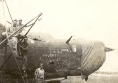 <p> M/Sgt Charles Kaeppel on the ground working with his crew on 757th BS  Aircraft named 