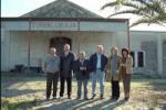 Caretaker, Mr. Caperto, Mario Capocefalo, Bob Brown, Laura Brown and Mrs. Caperto. 